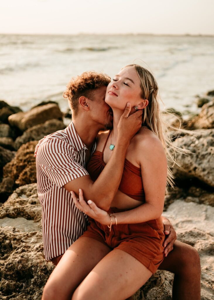 Couple-kissing-beach-portraits-chasing-creative