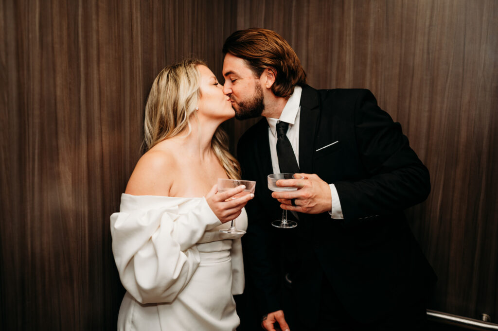 bride-and-groom-kissing-in-elevator-at-kompose-hotel-sarasota